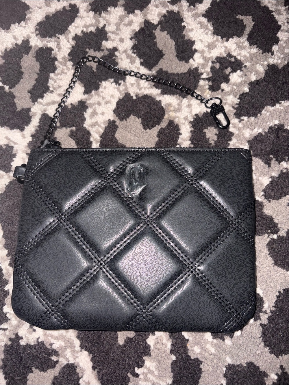 Steve Madden quilted pouch.